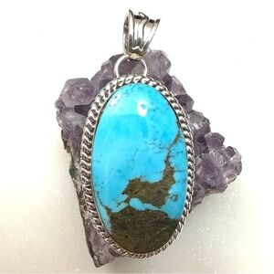 Running Bear Oval Cabochon Turquoise Sterling Silver Pendant